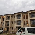 Modern condo building in Mount Prospect with dedicated parking spaces